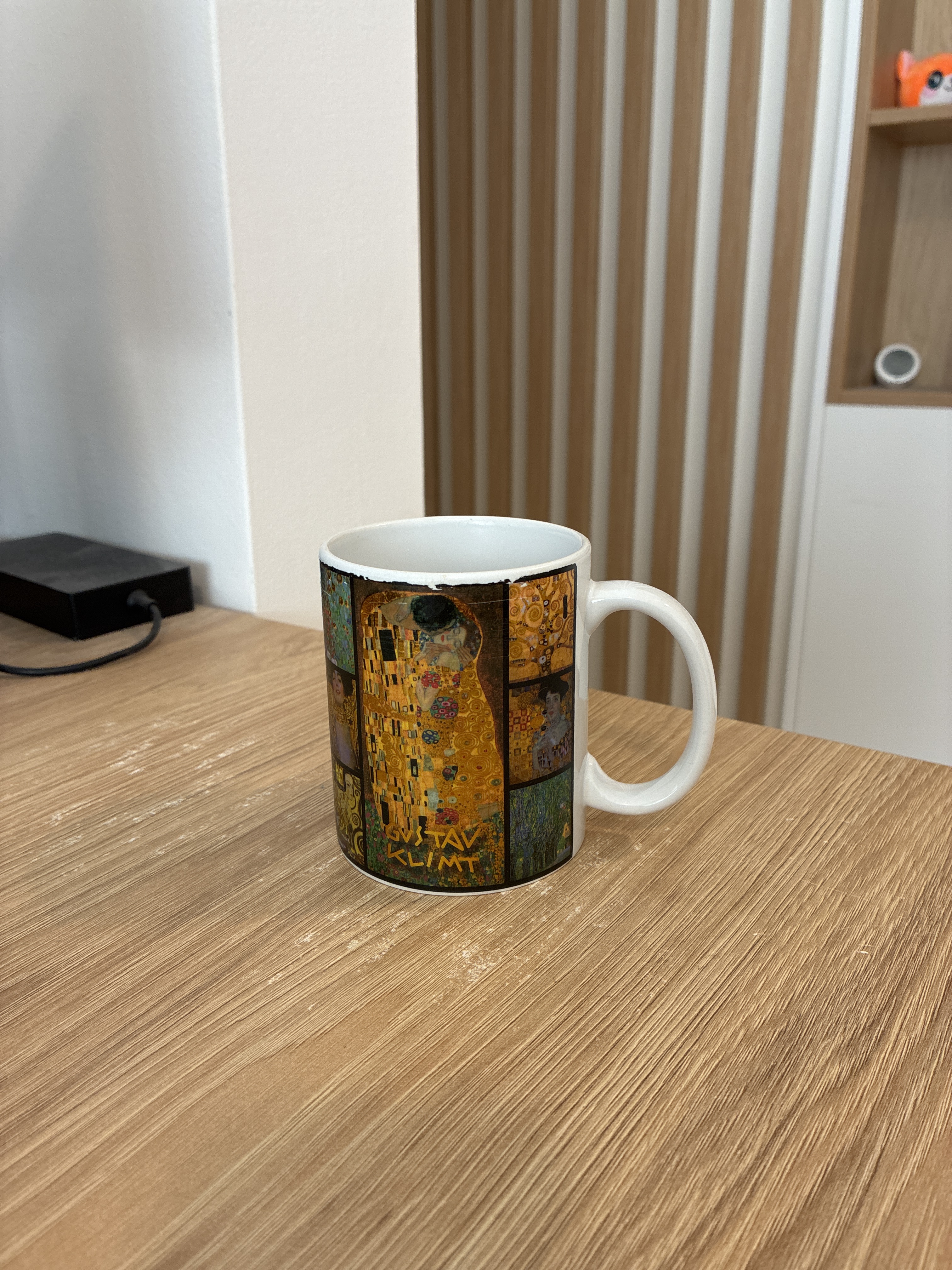 Raw phone photo of a product taken at home on a wooden surface — unedited